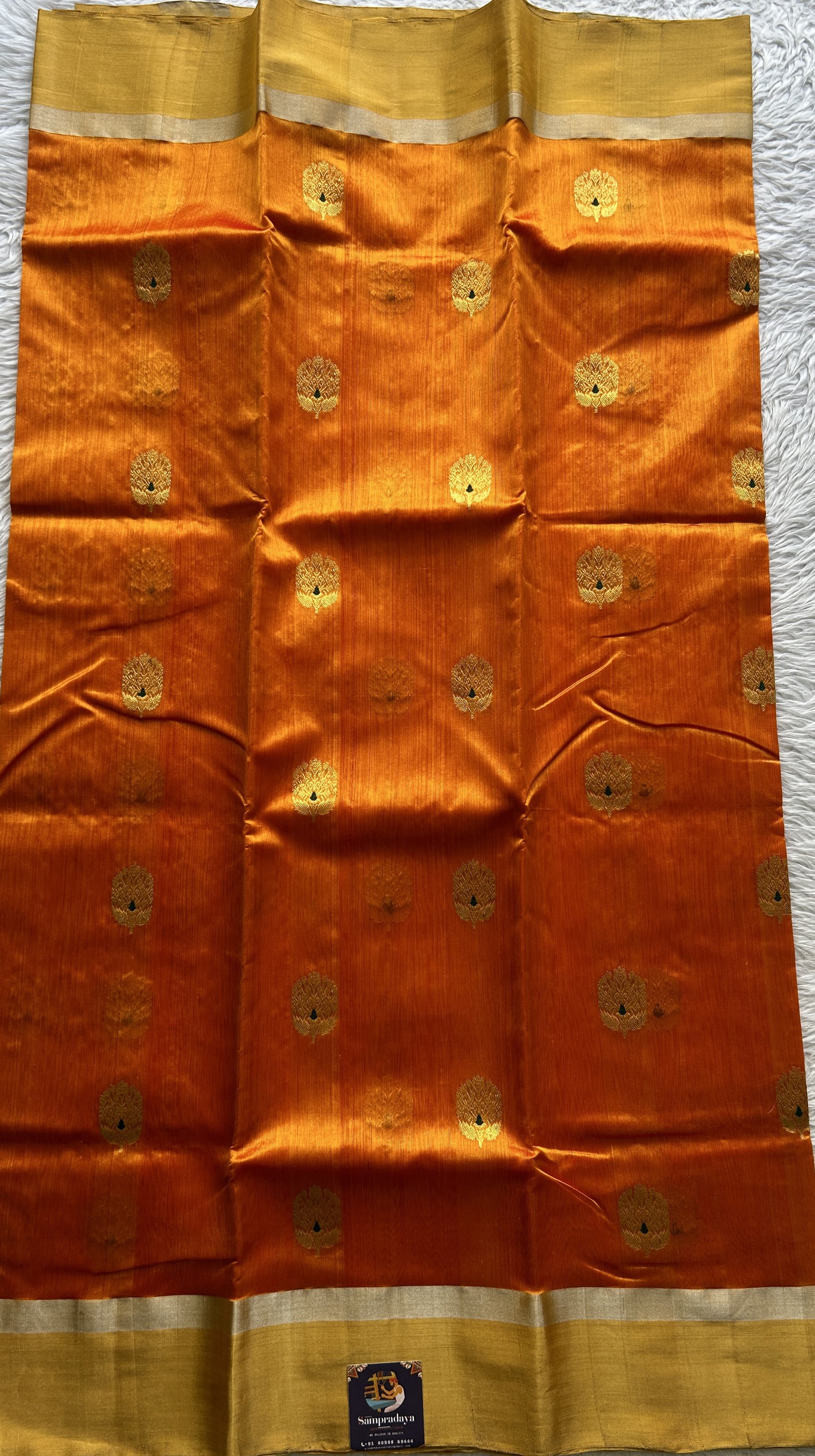 Chanderi Silk Saree Orange color complemented with a Zari border - Sampradaya Designer Studio