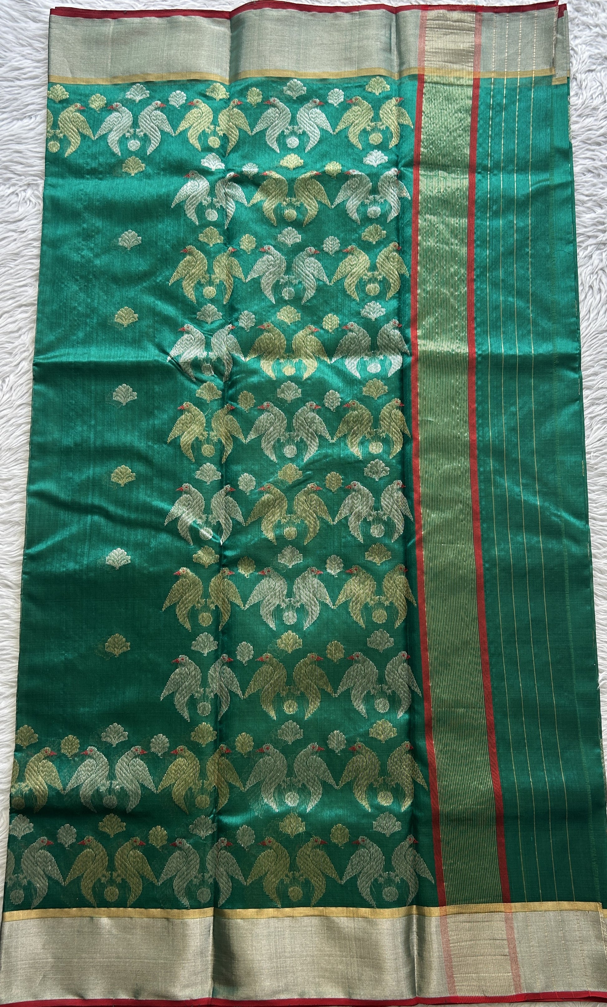 Chanderi Silk Saree Green color complemented with a Zari border - Sampradaya Designer Studio