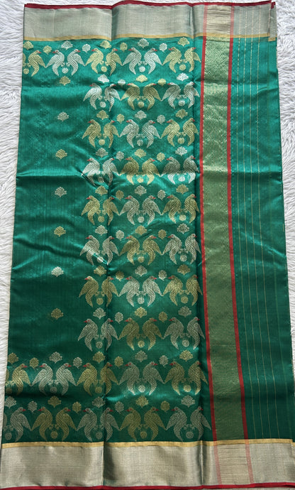 Chanderi Silk Saree Green color complemented with a Zari border - Sampradaya Designer Studio