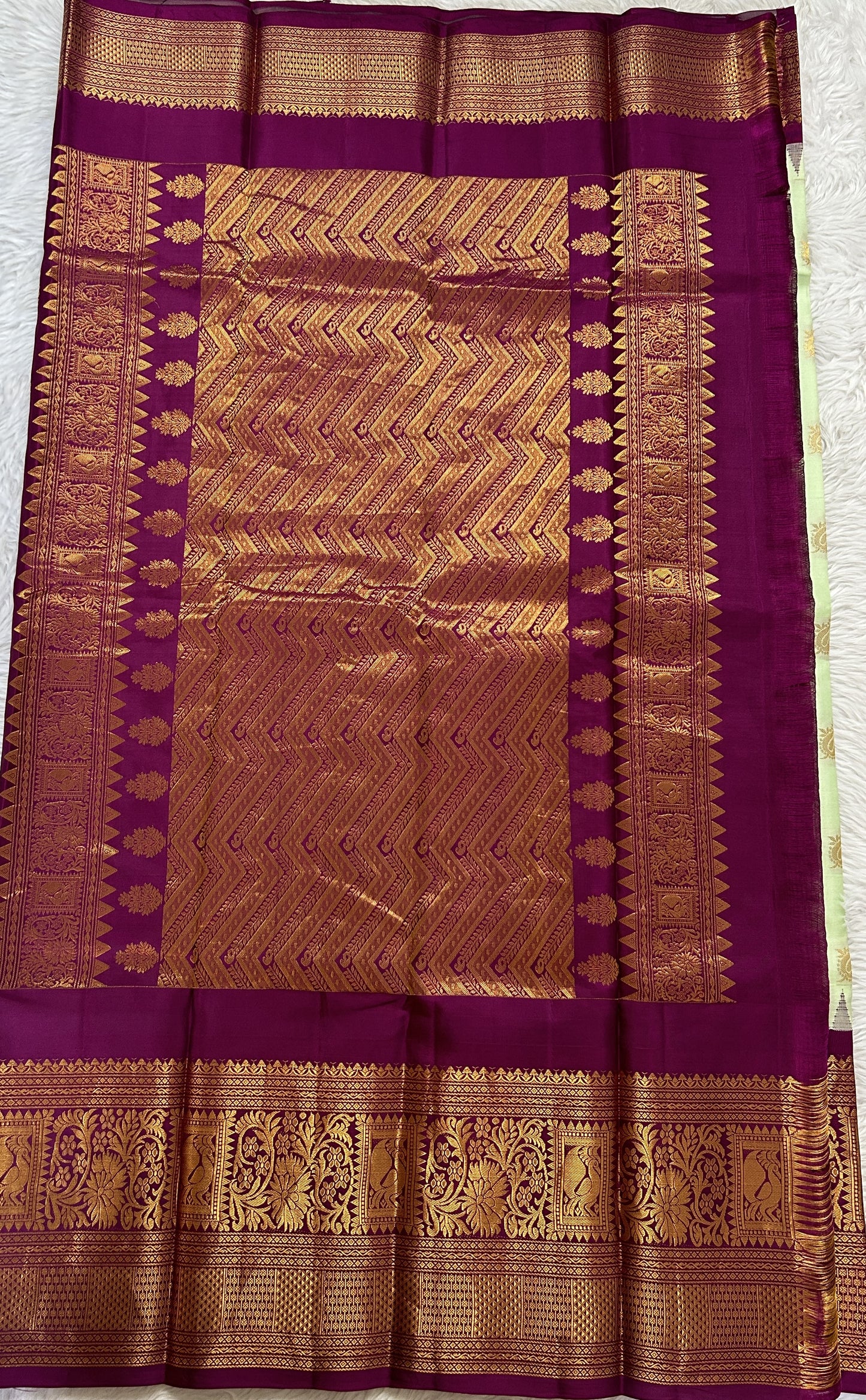 Gadwal Silk Saree Light Green colored complemented with a Magenta Color Kanchi Border - Sampradaya Designer Studio