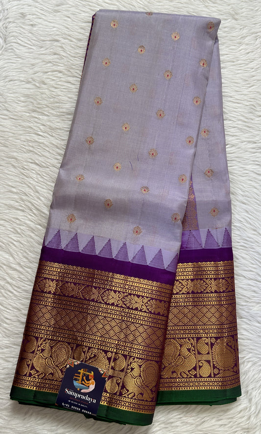Gadwal Silk Saree Light Lavender colored complemented with a Purple Color Kanchi Border - Sampradaya Designer Studio