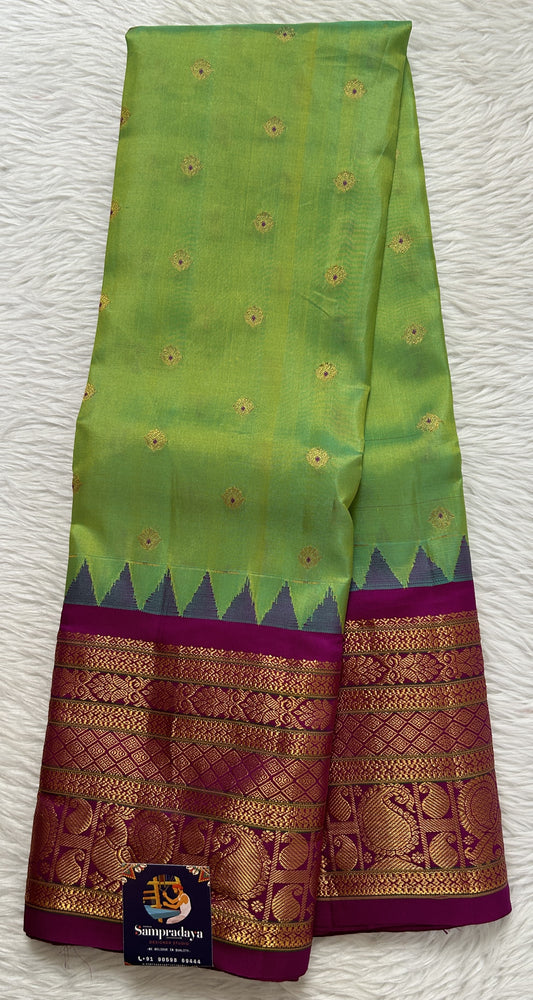 Gadwal Silk Saree Green colored complemented with a Magenta Color Kanchi Border - Sampradaya Designer Studio