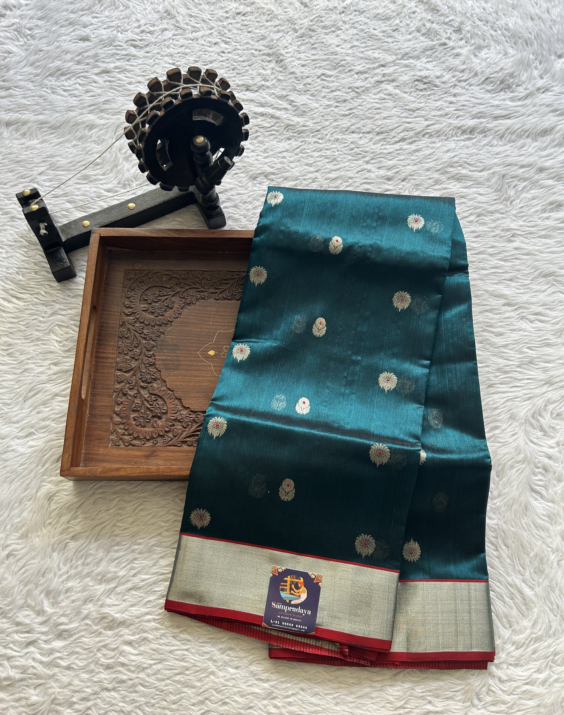 Chanderi Silk Saree Peacock Green color complemented with a Silver Zari border - Sampradaya Designer Studio