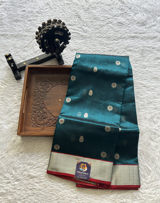 Chanderi Silk Saree Peacock Green color complemented with a Silver Zari border - Sampradaya Designer Studio