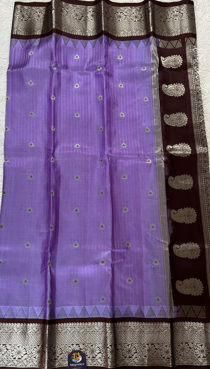 Gadwal Silk Saree Lavender colored complemented with a Brown Color Kanchi Border - Sampradaya Designer Studio