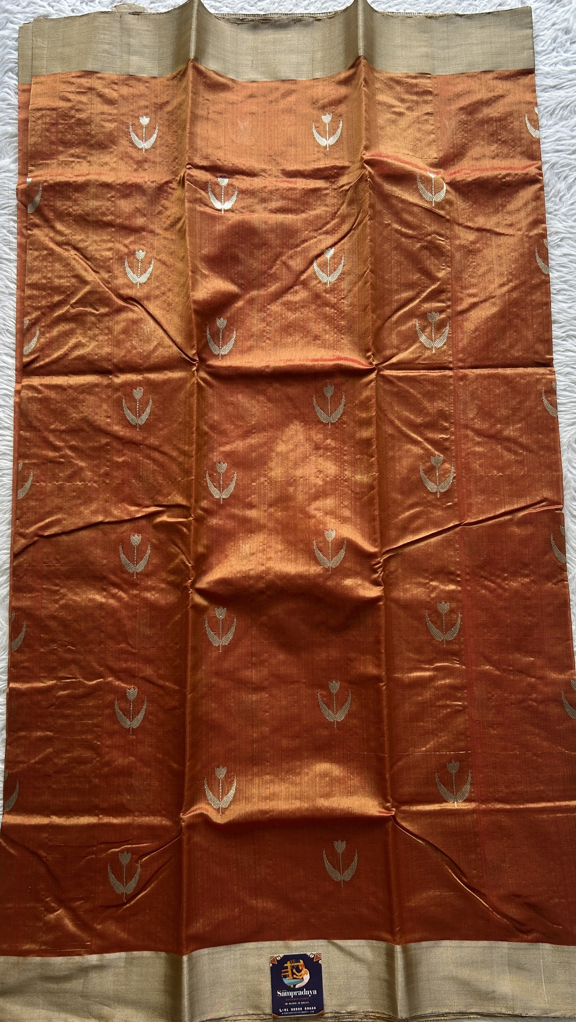 Chanderi Silk Saree Pumpkin Orange color complemented with a Zari border - Sampradaya Designer Studio