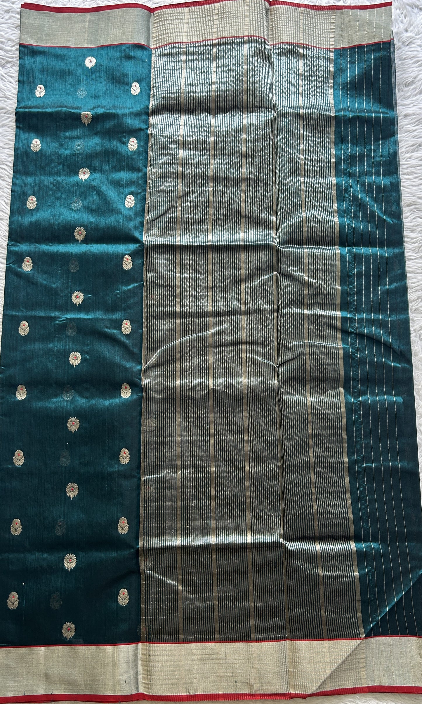 Chanderi Silk Saree Peacock Green color complemented with a Silver Zari border - Sampradaya Designer Studio