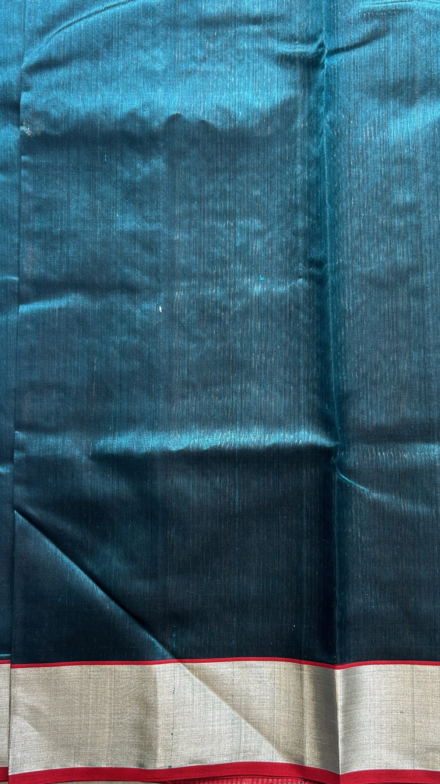 Chanderi Silk Saree Peacock Green color complemented with a Silver Zari border - Sampradaya Designer Studio