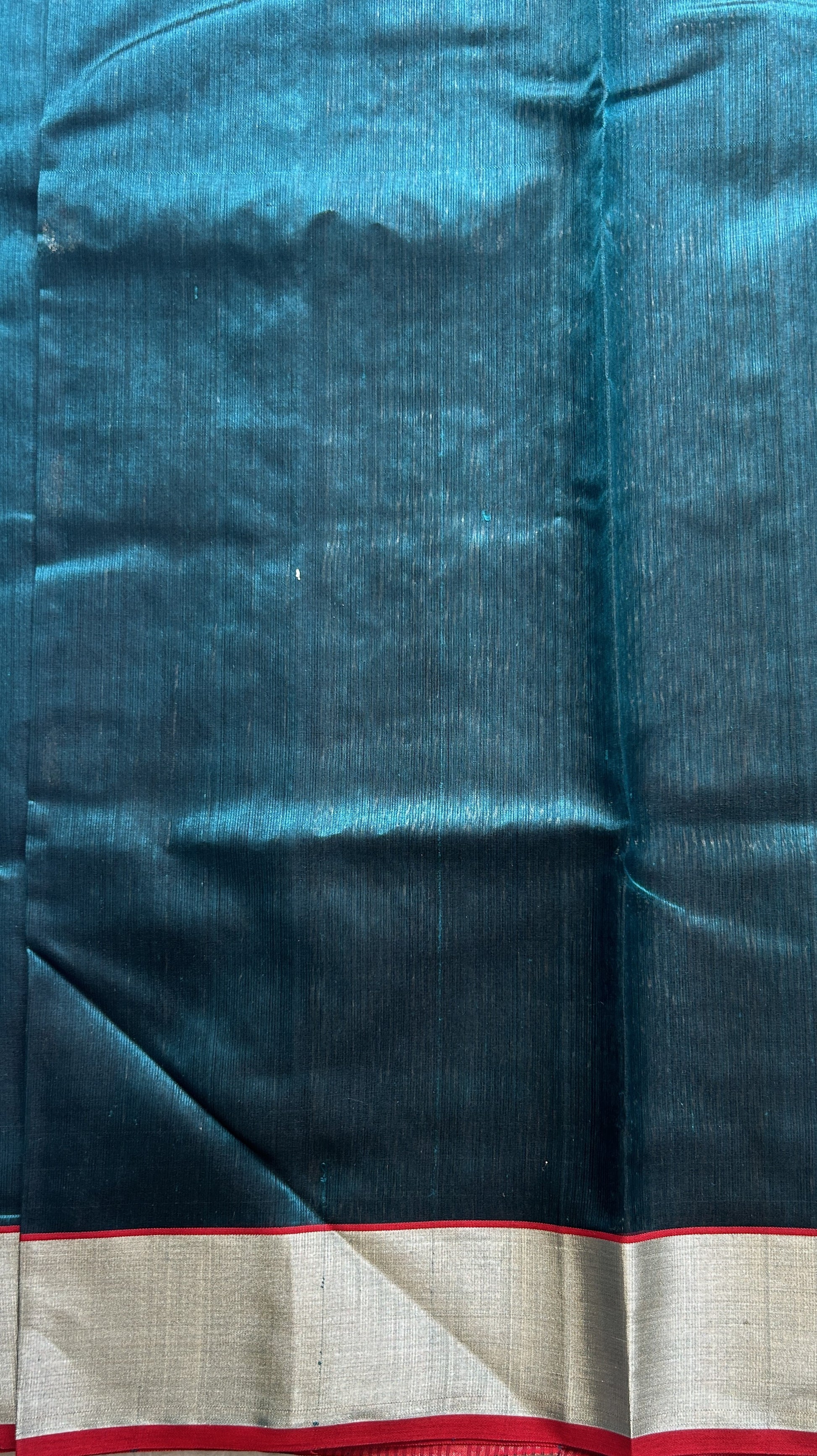 Chanderi Silk Saree Peacock Green color complemented with a Silver Zari border - Sampradaya Designer Studio