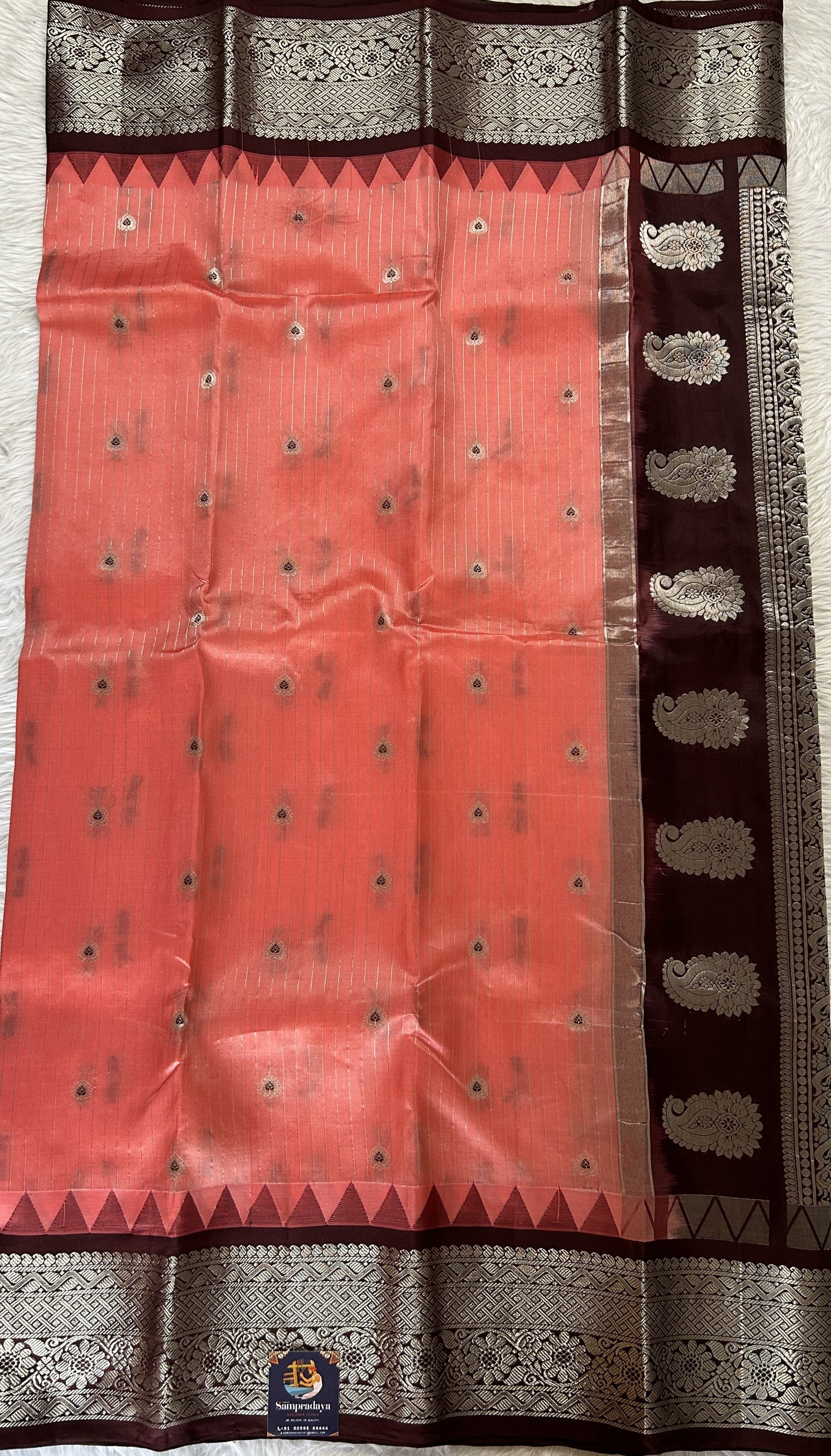 Gadwal Silk Saree Peach colored complemented with a Brown Color Kanchi Border - Sampradaya Designer Studio