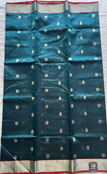 Chanderi Silk Saree Peacock Green color complemented with a Silver Zari border - Sampradaya Designer Studio