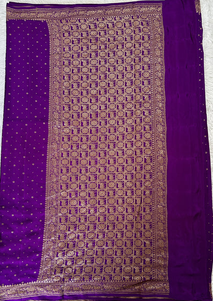Banarasi Georgette Saree Purple Colored Complemented with a Zari border. - Sampradaya Designer Studio