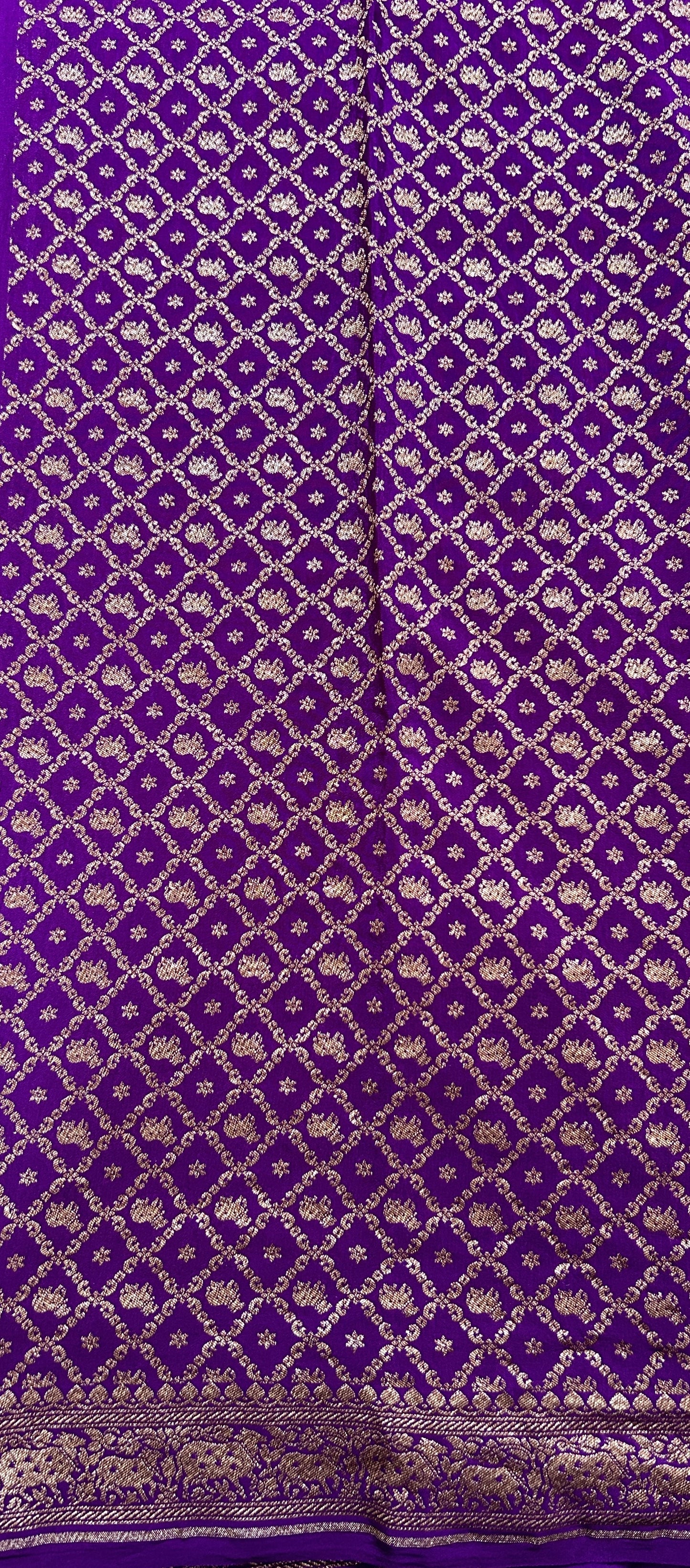 Banarasi Georgette Saree Purple Colored Complemented with a Zari border. - Sampradaya Designer Studio