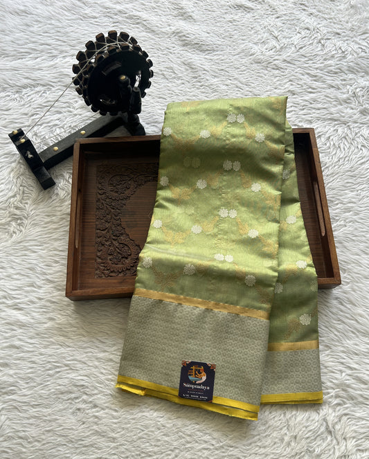 Chanderi Silk Saree Spring Green color complemented with a Zari border - Sampradaya Designer Studio