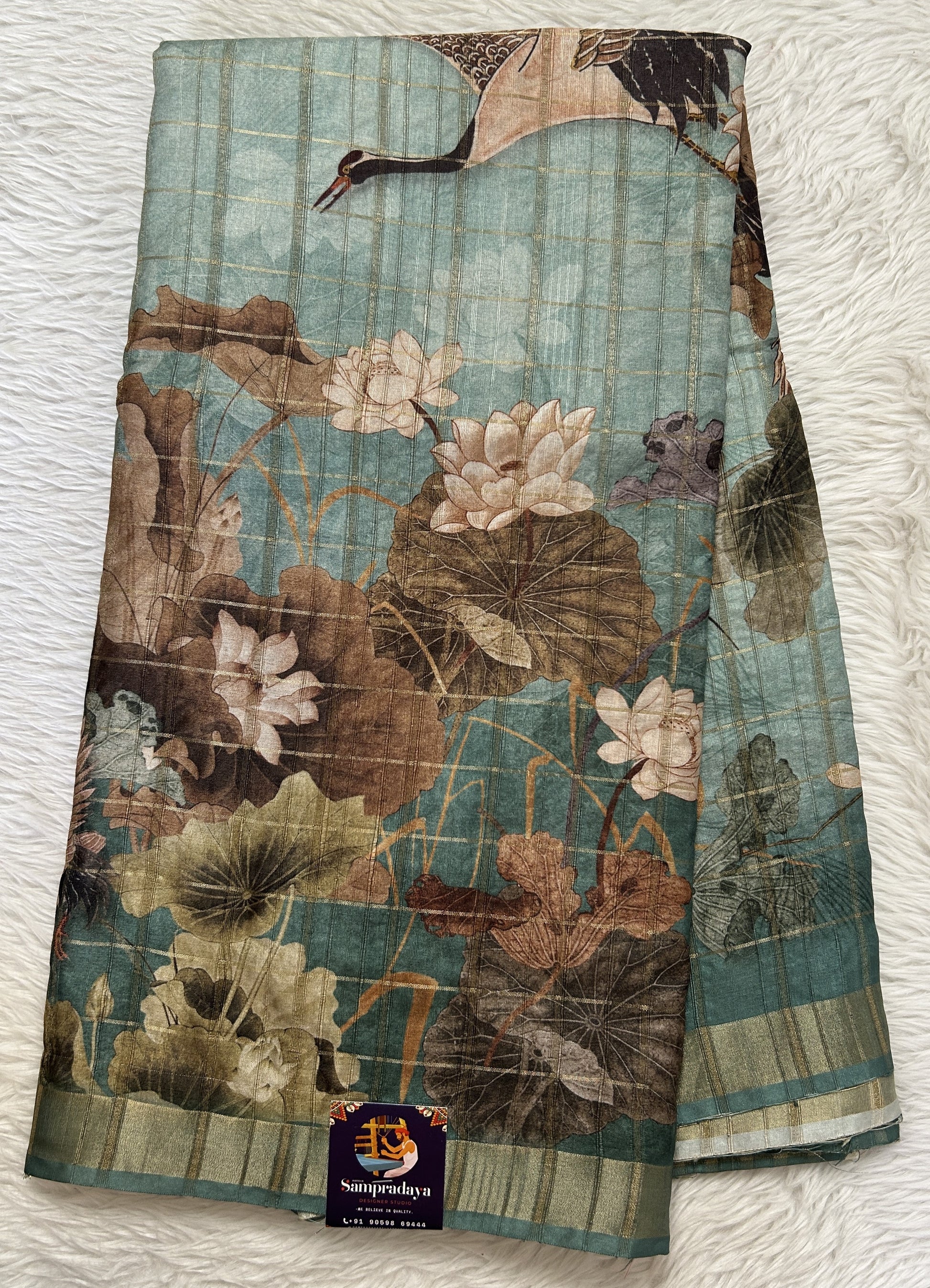 Semi Tussar Tissue Designer Saree Green Blue colored Saree complemented with a Zari Border. - Sampradaya Designer Studio