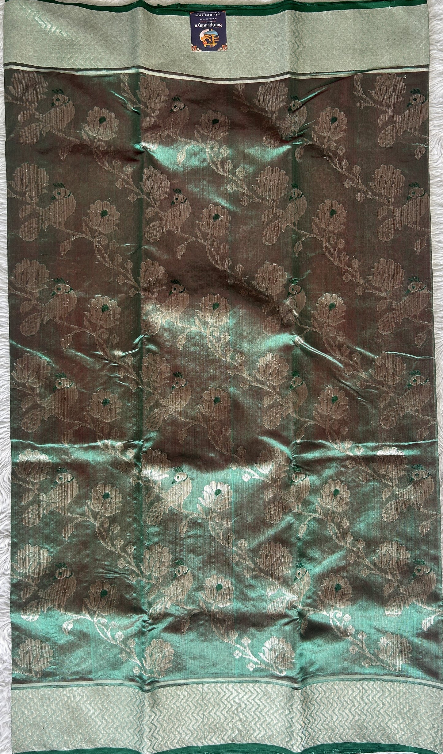 Chanderi Silk Saree Light Teal Green color complemented with a Zari border - Sampradaya Designer Studio