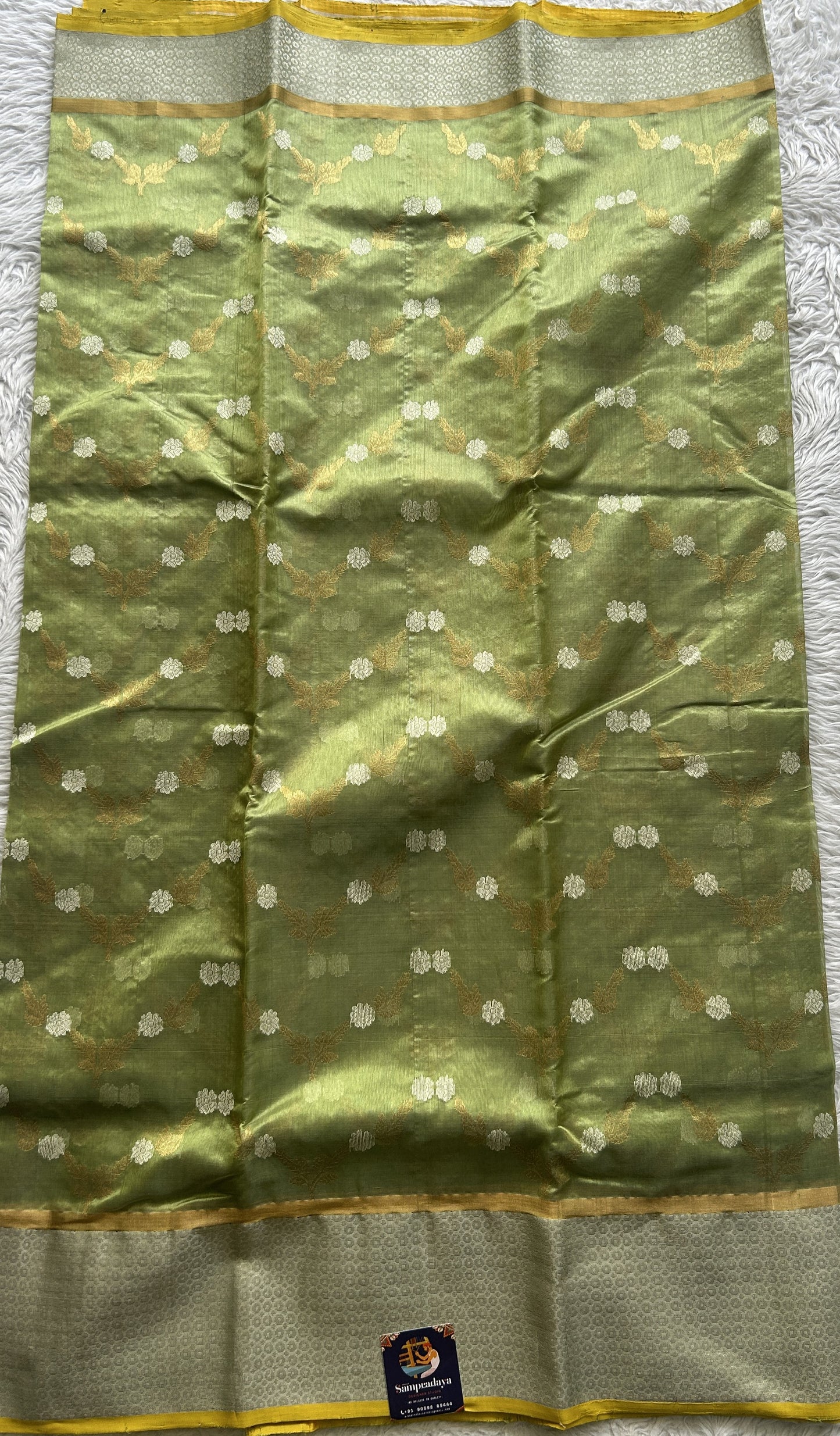 Chanderi Silk Saree Spring Green color complemented with a Zari border - Sampradaya Designer Studio