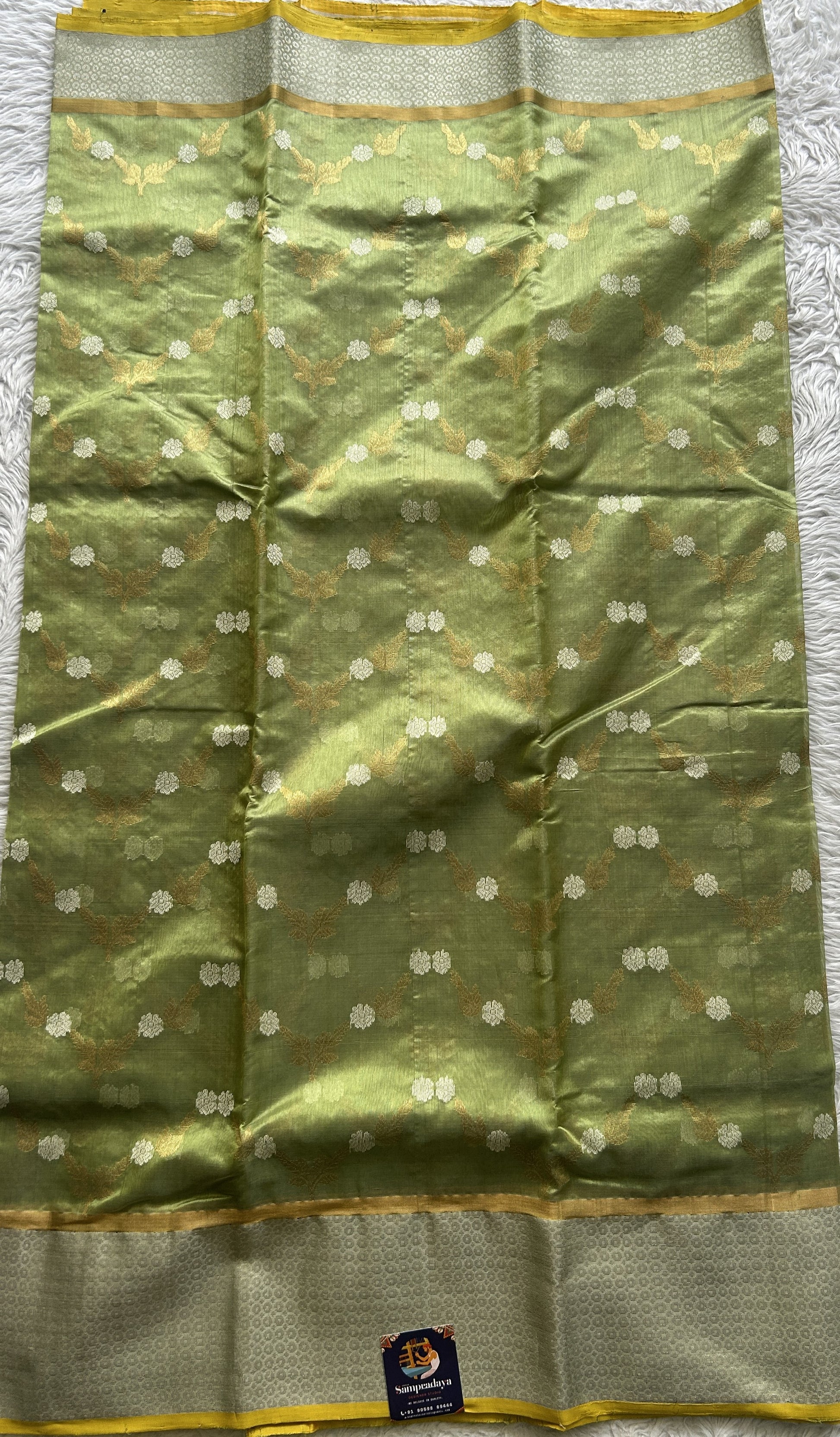 Chanderi Silk Saree Spring Green color complemented with a Zari border - Sampradaya Designer Studio