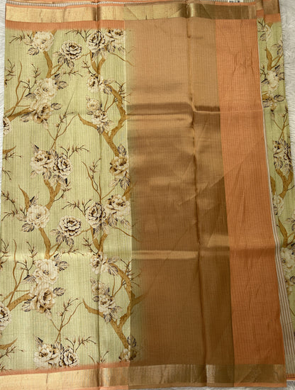 Semi Tussar Tissue Designer Saree Light Lemon Green colored Saree complemented with a Pastel Orange Zari Border. - Sampradaya Designer Studio