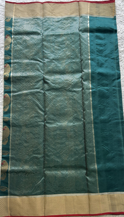 Chanderi Silk Saree Rama Green color complemented with a Zari border - Sampradaya Designer Studio
