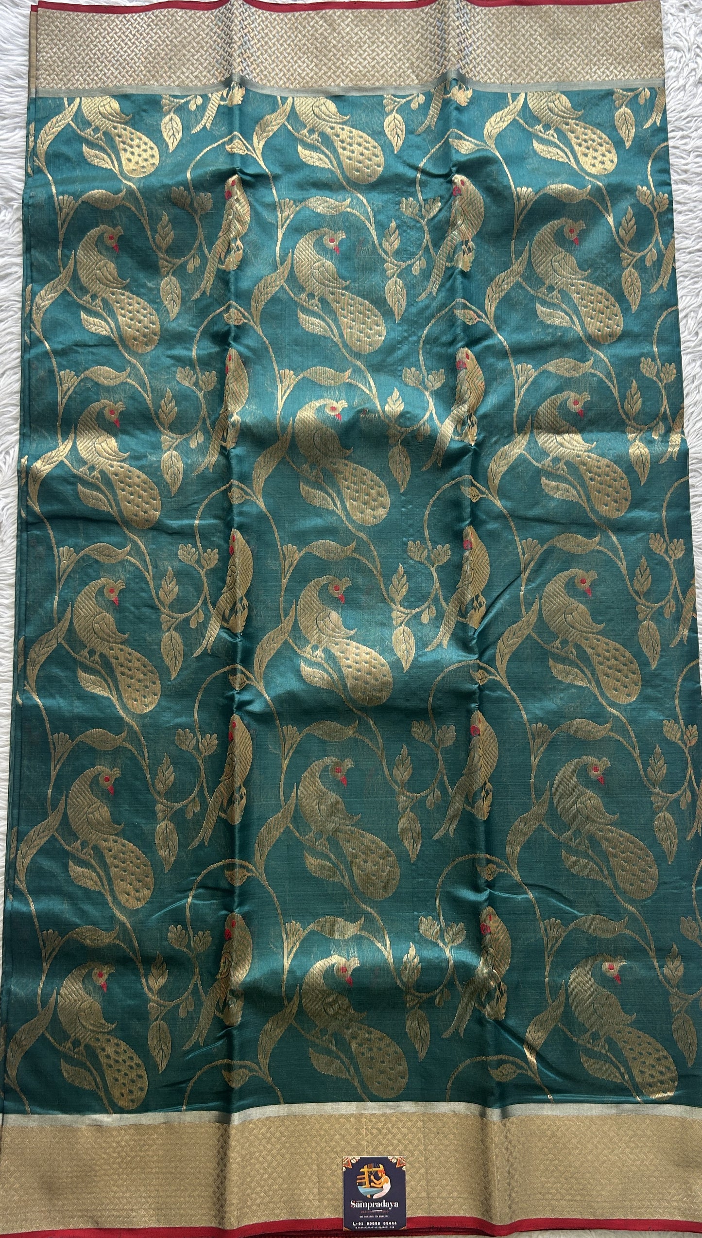 Chanderi Silk Saree Rama Green color complemented with a Zari border - Sampradaya Designer Studio