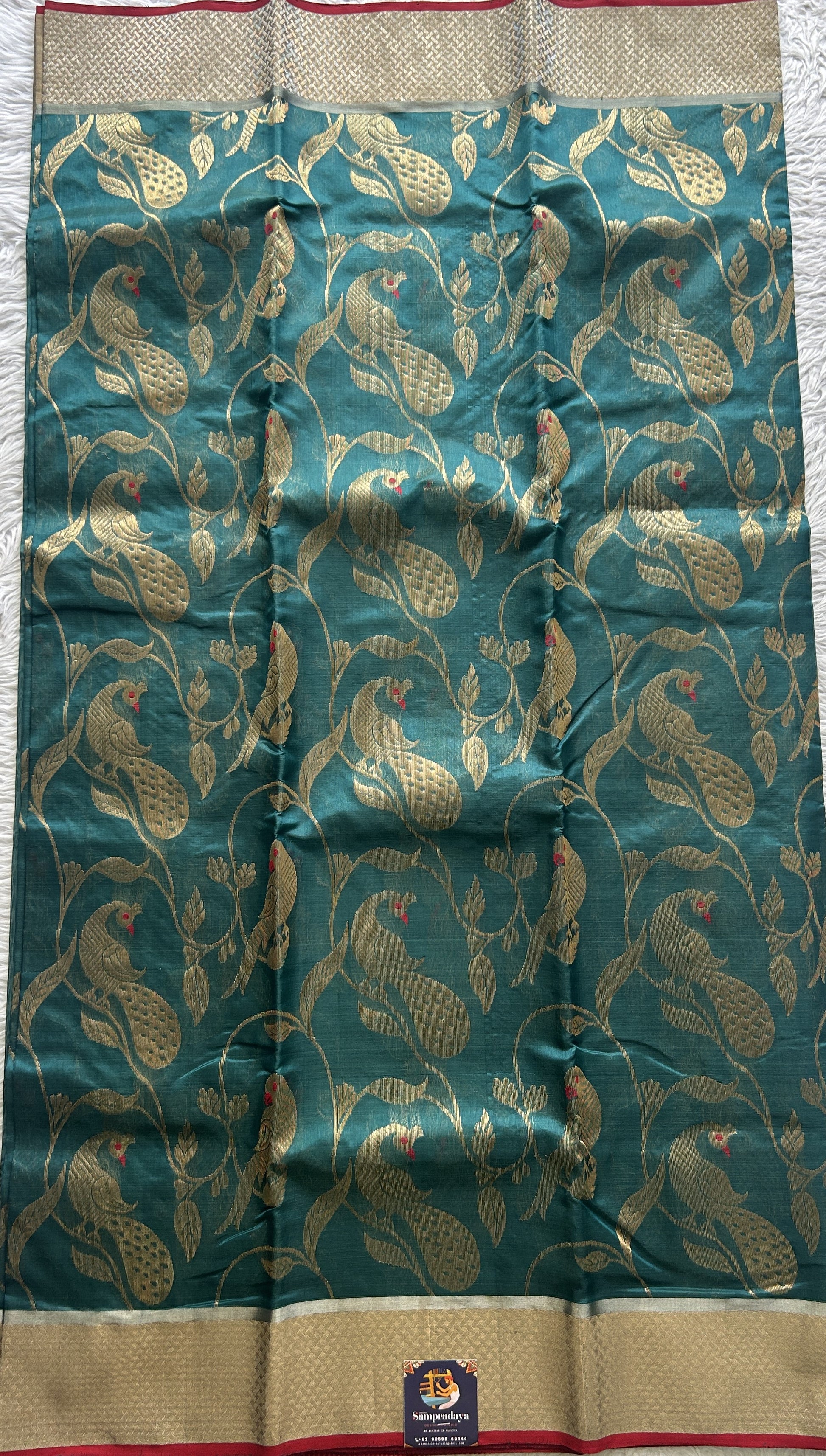 Chanderi Silk Saree Rama Green color complemented with a Zari border - Sampradaya Designer Studio