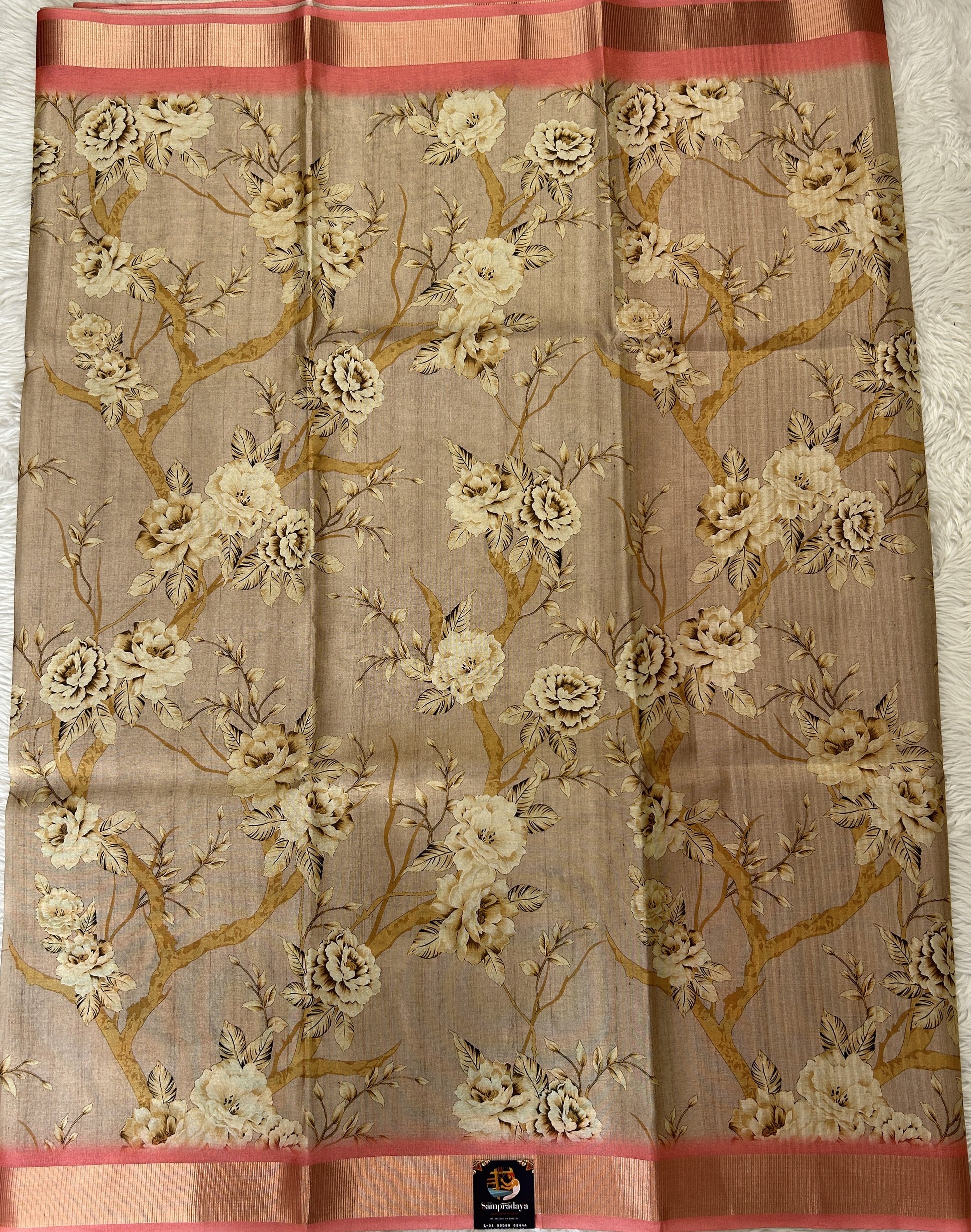 Semi Tussar Tissue Designer Saree Pastel Brown colored complemented with a Peach Color Zari Border. - Sampradaya Designer Studio