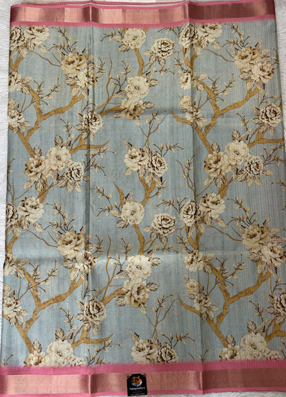 Semi Tussar Tissue Designer Saree Pastel Blue colored complemented with a Pink Color Zari Border. - Sampradaya Designer Studio