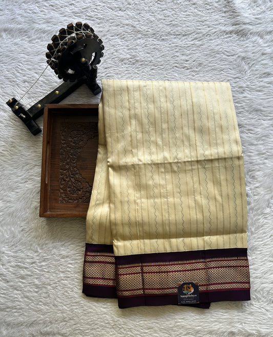 Narayanpet Silk Saree Cream Colored Complemented with a Violet Zari Border. - Sampradaya Designer Studio