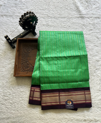 Narayanpet Silk Saree Green Colored Complemented with a Violet Zari Border. - Sampradaya Designer Studio