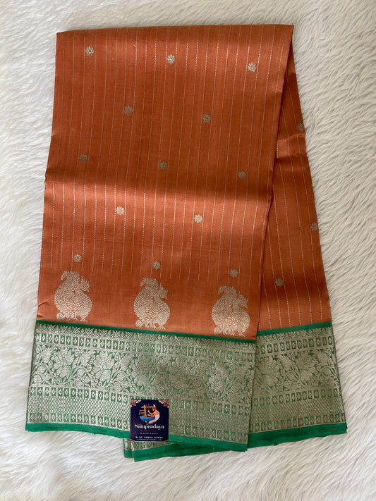 Venkatagiri Pattu Saree Apricot Brown Colored Complemented With a Pattu Lux Green Color Border - Sampradaya Designer Studio