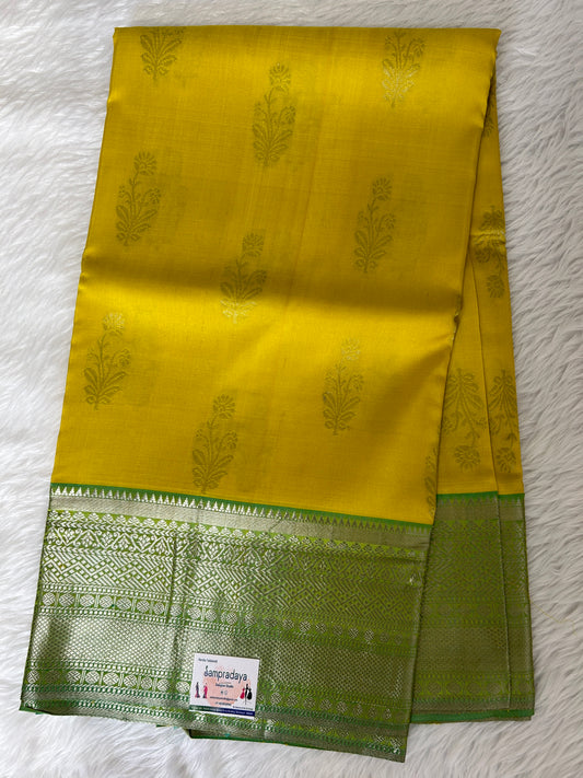 Venkatagiri Pattu Saree Yellow Colored Complemented With a Pattu Lux Green Color Border - Sampradaya Designer Studio