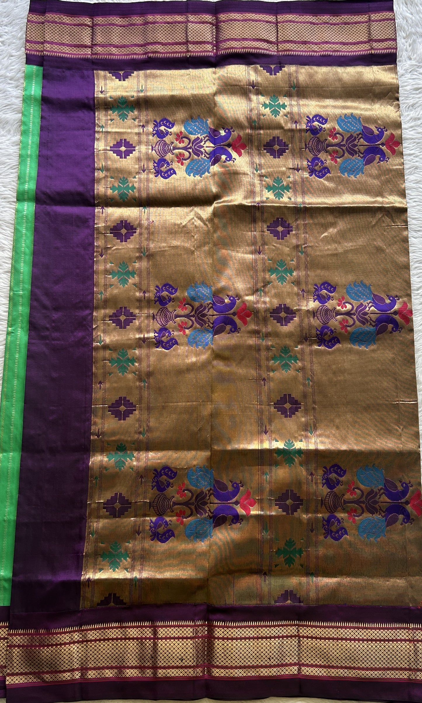 Narayanpet Silk Saree Green Colored Complemented with a Violet Zari Border. - Sampradaya Designer Studio