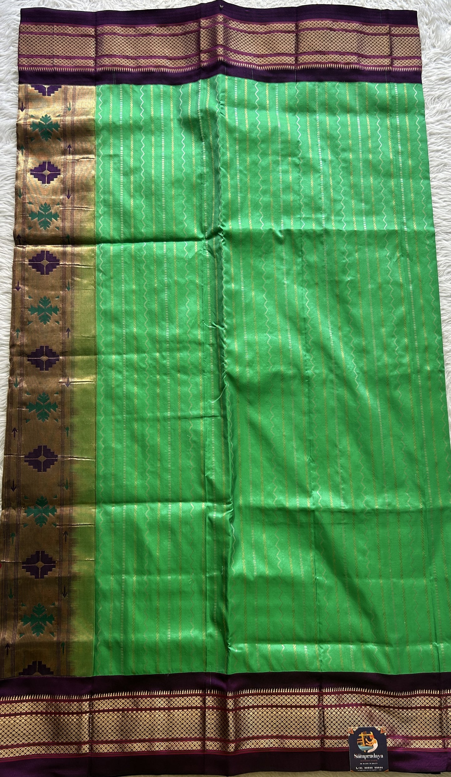 Narayanpet Silk Saree Green Colored Complemented with a Violet Zari Border. - Sampradaya Designer Studio