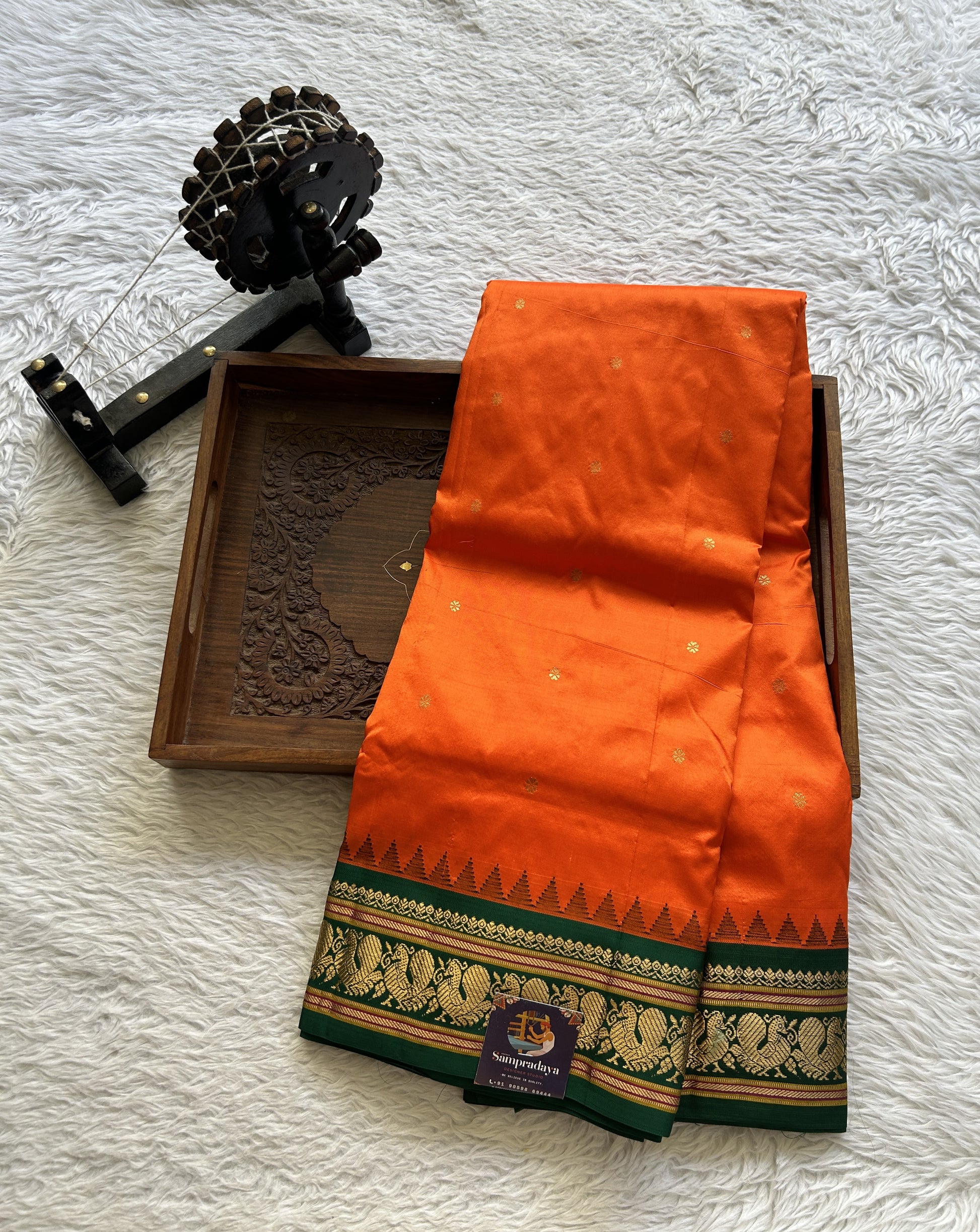 Narayanpet Silk Saree Orange Colored Complemented with a Green Zari Border. - Sampradaya Designer Studio