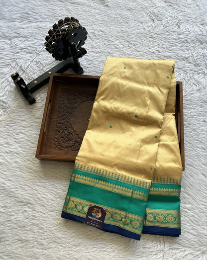 Narayanpet Silk Saree Cream Colored Complemented with a Rama Green Zari Border. - Sampradaya Designer Studio