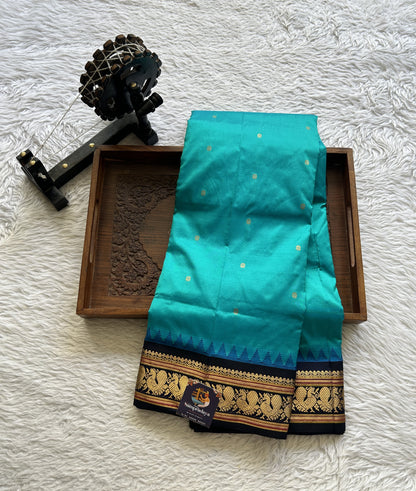 Narayanpet Silk Saree Rama Green Colored Complemented with a Navy Blue Zari Border. - Sampradaya Designer Studio
