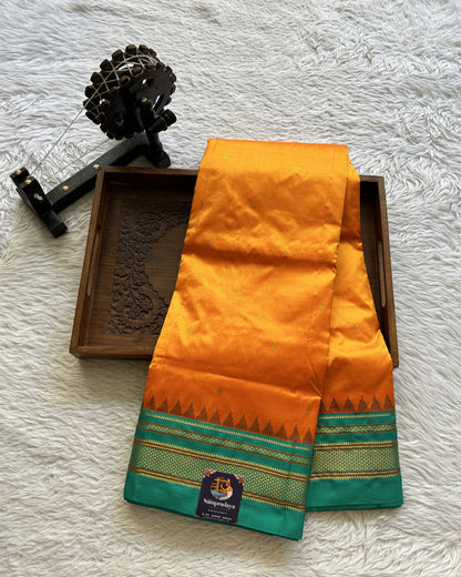 Narayanpet Silk Saree Orange Colored Complemented with a Rama Green Zari Border. - Sampradaya Designer Studio