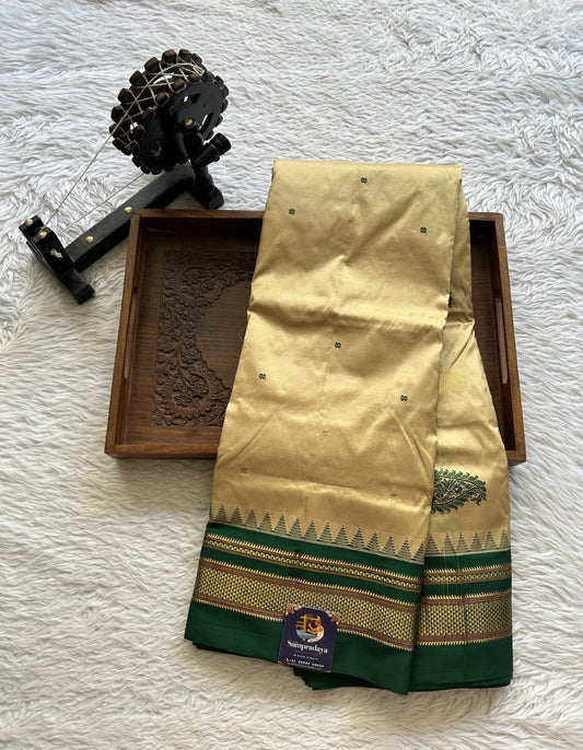 Narayanpet Silk Saree Beige Colored Complemented with a Green Zari Border. - Sampradaya Designer Studio