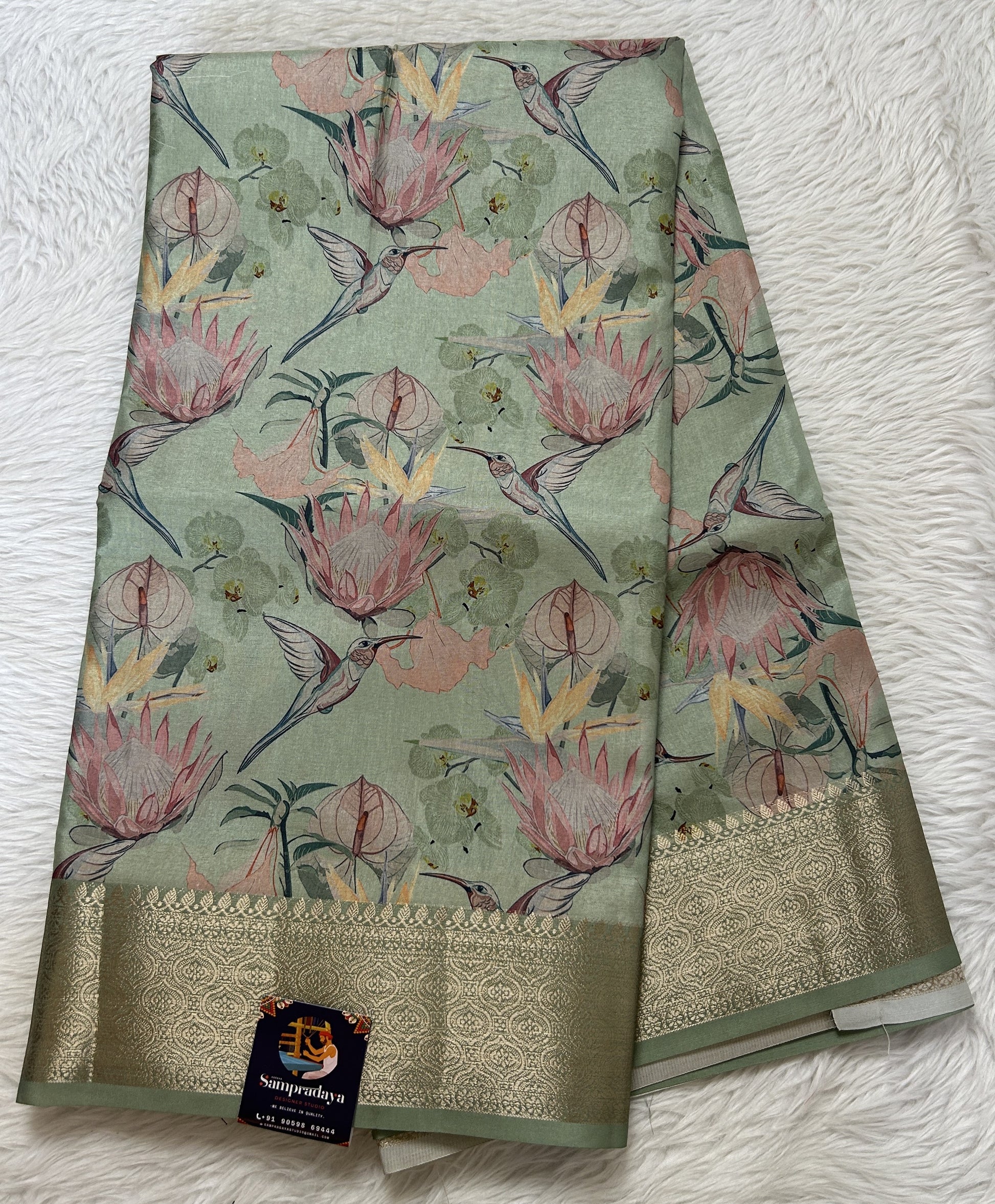 Banarasi Soft Silk Saree Pastel Green Colored Complemented with a Zari Border. - Sampradaya Designer Studio