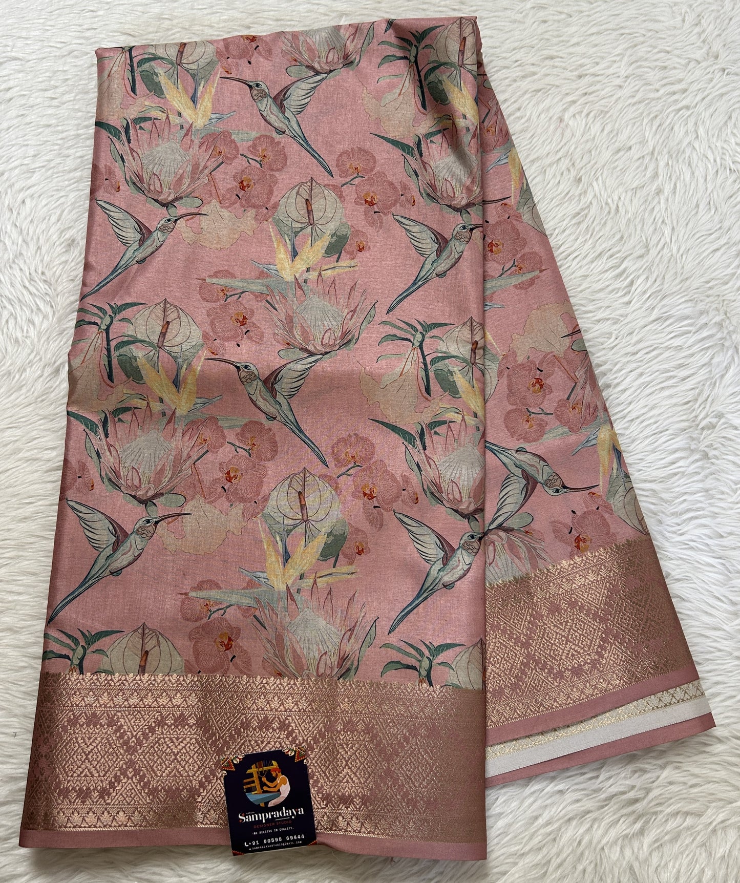 Banarasi Soft Silk Saree Peach Colored Complemented with a Zari Border. - Sampradaya Designer Studio