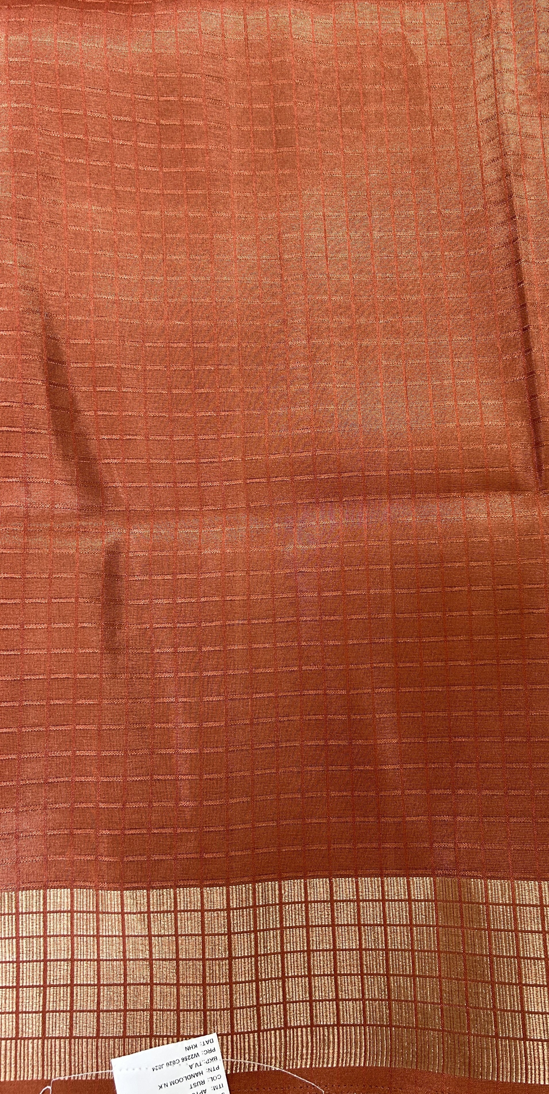 Semi Tussar Tissue Designer Saree Brick colored complemented with a Zari Border. - Sampradaya Designer Studio