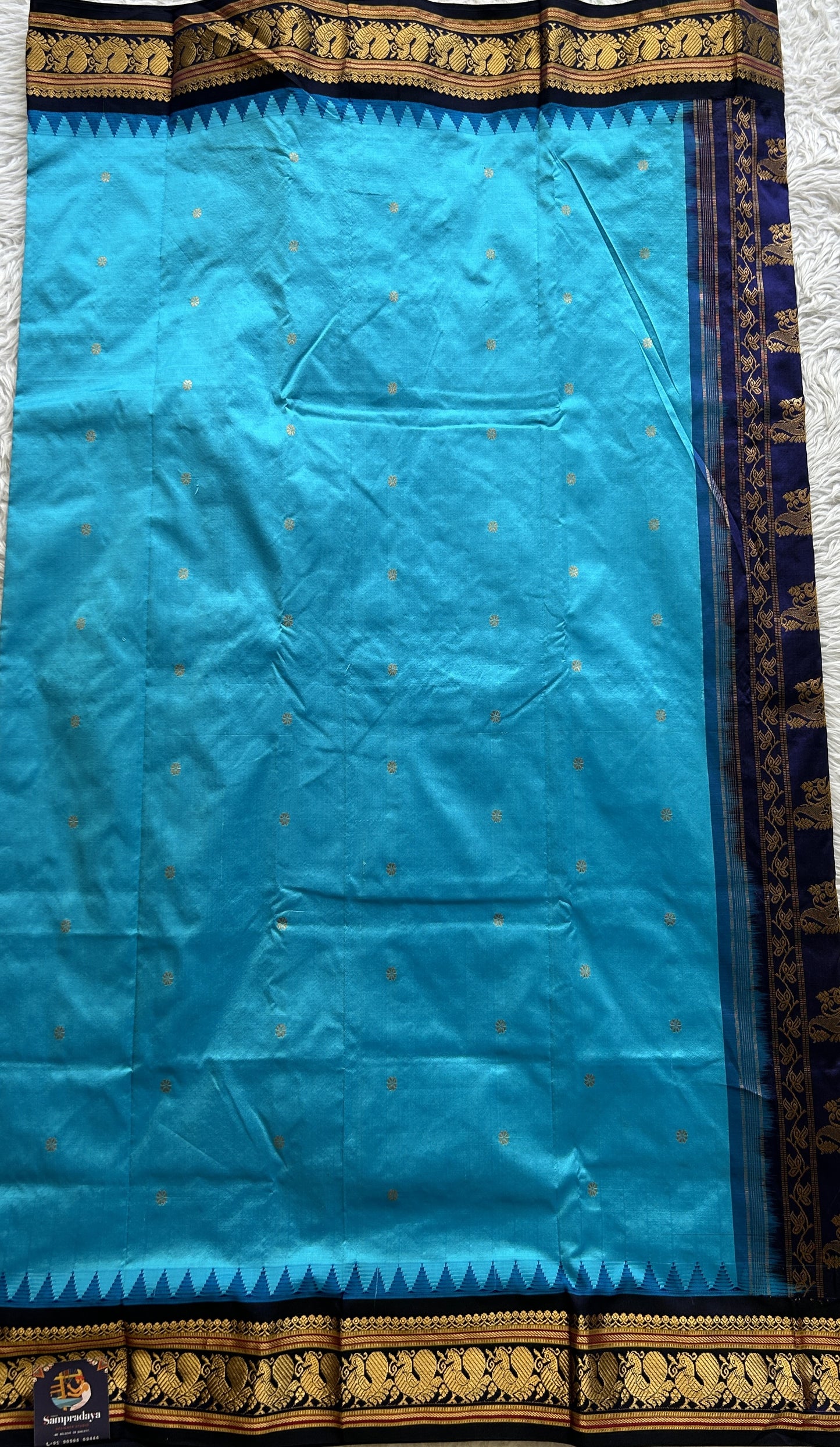 Narayanpet Silk Saree Sky Blue Colored Complemented with a Navy Blue Zari Border. - Sampradaya Designer Studio