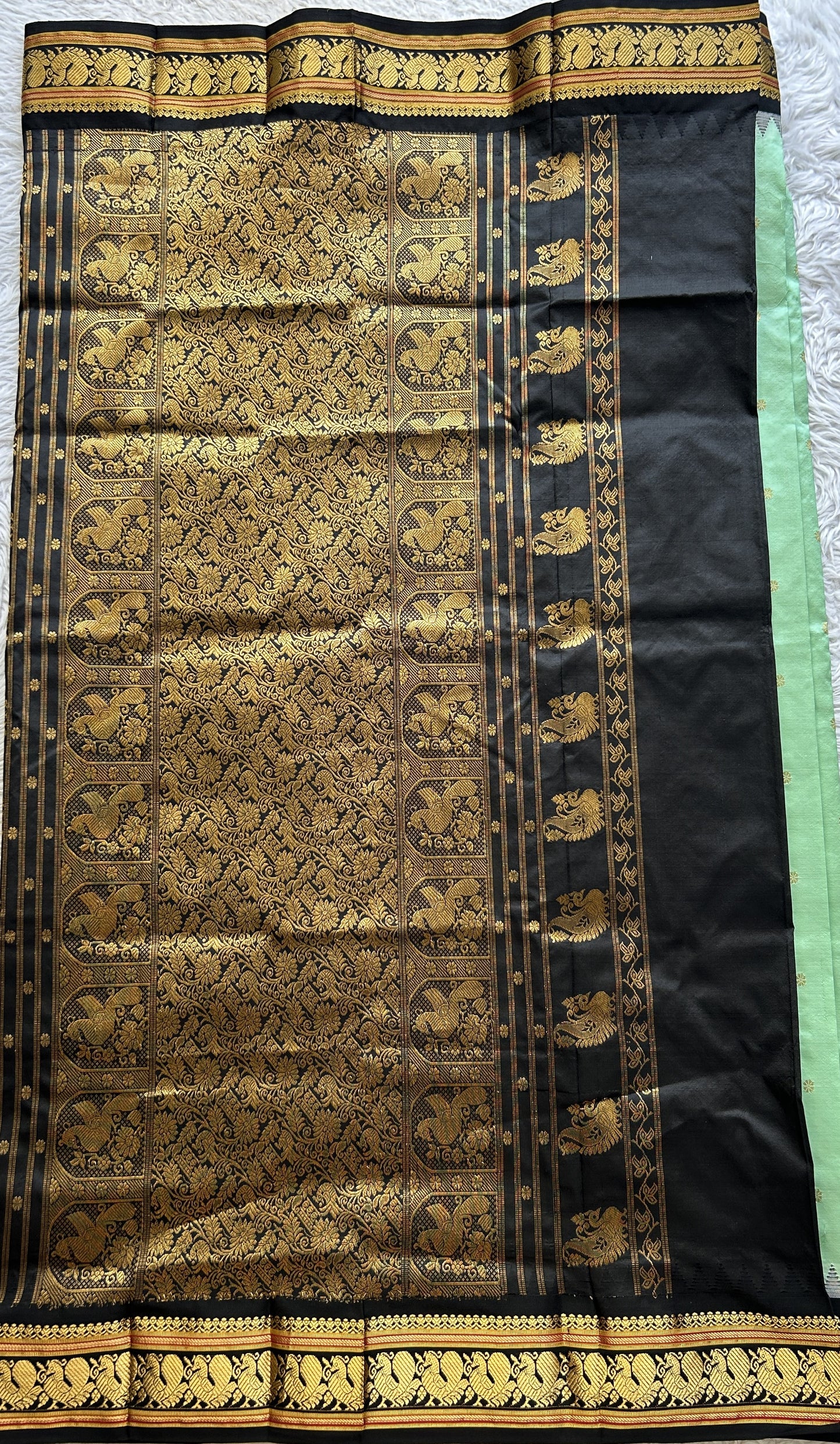 Narayanpet Silk Saree Mint Green Colored Complemented with a Black Zari Border. - Sampradaya Designer Studio