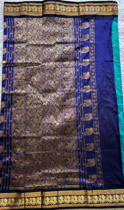 Narayanpet Silk Saree Rama Green Colored Complemented with a Navy Blue Zari Border. - Sampradaya Designer Studio