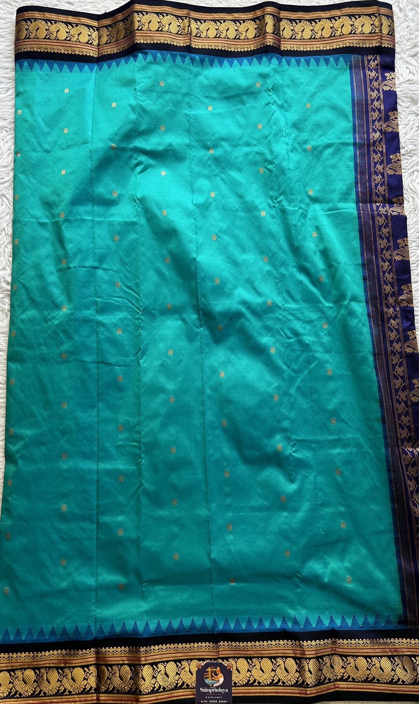 Narayanpet Silk Saree Rama Green Colored Complemented with a Navy Blue Zari Border. - Sampradaya Designer Studio
