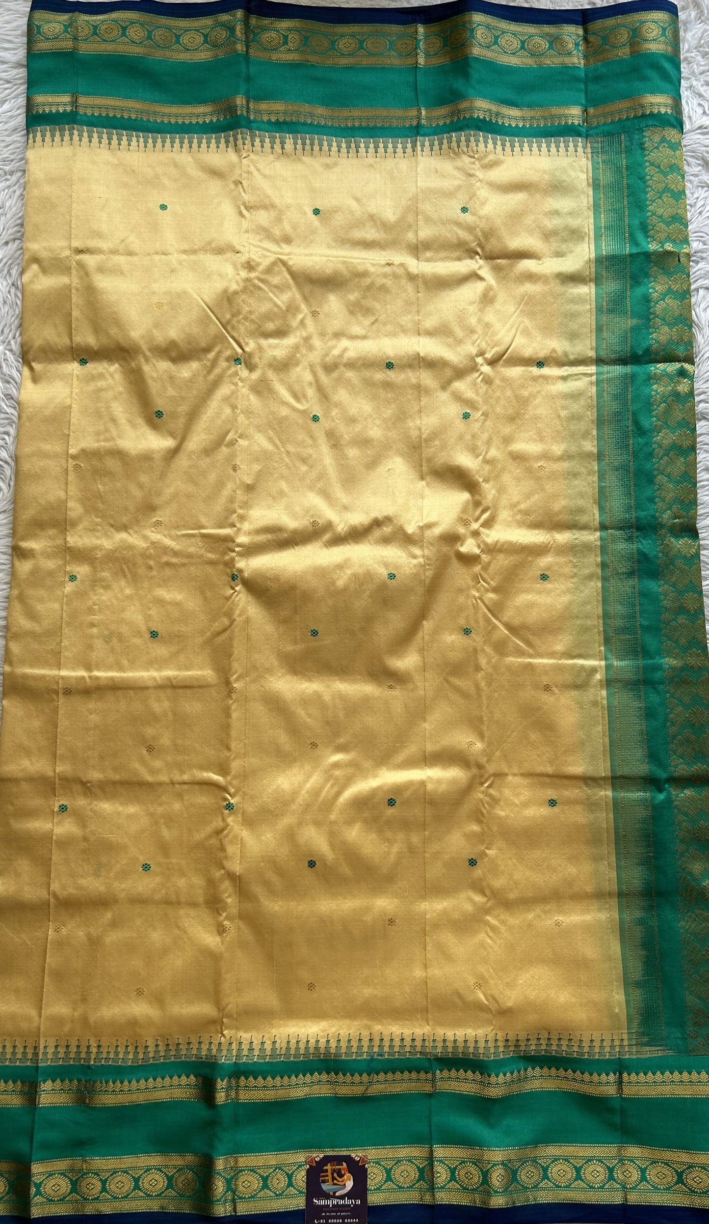 Narayanpet Silk Saree Cream Colored Complemented with a Rama Green Zari Border. - Sampradaya Designer Studio