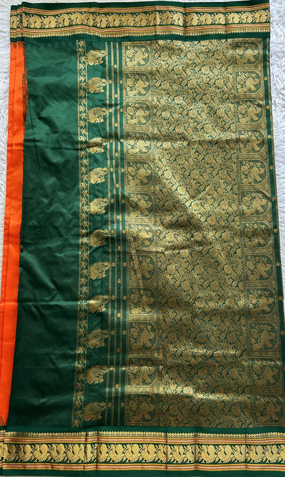 Narayanpet Silk Saree Orange Colored Complemented with a Green Zari Border. - Sampradaya Designer Studio