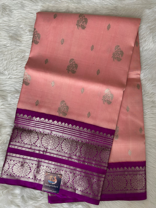 Venkatagiri Pattu Saree Blushing Peach Colored Complemented With a Pattu Purple Color Kuttu Border - Sampradaya Designer Studio