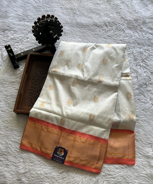 Narayanpet Silk Saree White Colored Complemented with a Peach Zari Border. - Sampradaya Designer Studio